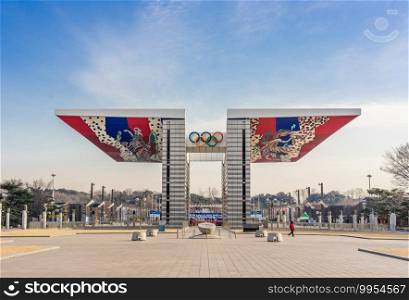 SEOUL, SOUTH KOREA - JANUARY 01, 2019  World Peace Gate is a colorful gate built in Olympic Park as a sign of peace and harmony for the 1988 Seoul Summer Olympics. Clear blue sky background.