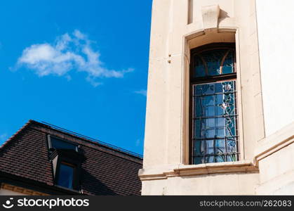 SEP 26, 2013 Neuchatel, Switzerland - Old vintage building stainglass window in La Chaux de Fonds, the most important centre of the Swiss watch making industry