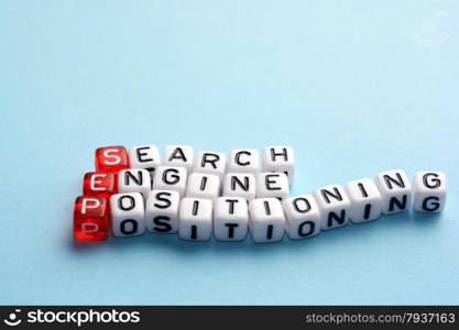 SEP Search Engine Positioning written on cubes on blue surface