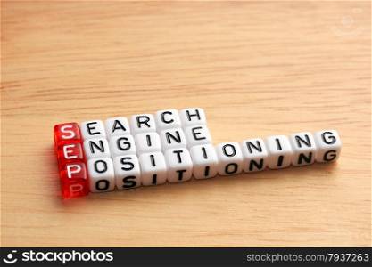 SEP Search Engine Positioning written on cubes on wooden surface