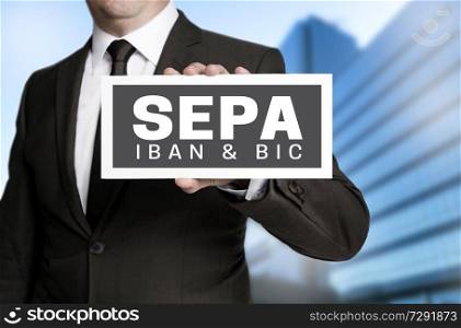 Sepa sign is held by businessman.. Sepa sign is held by businessman