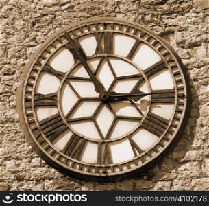 sepia face of a clock