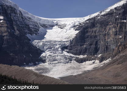 Seracs of ice and snow tumble onto the Dome Glacier falls from the Colmbia Ice Field near the top of Snow Dome.