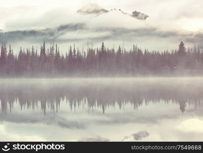 Serene beautiful lake in morning mountains, Oregon, USA.