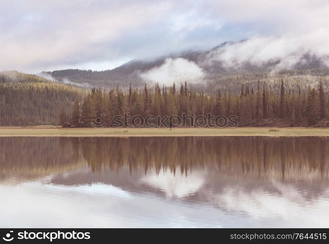 Serene beautiful lake in morning mountains, Oregon, USA.