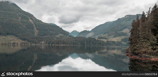 Serene scene by the mountain lake in Canada