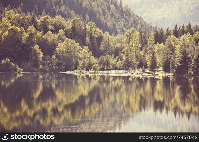 Serenity lake in the mountains in summer season