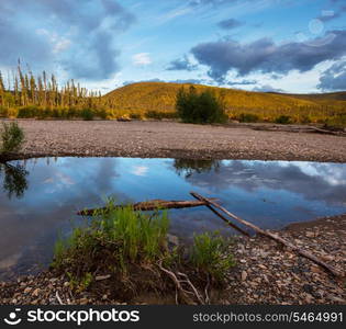 Serenity lake in tundra on Alaska