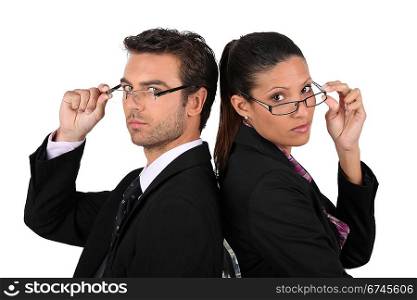 Serious and successful businesspeople on white background