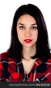 Serious brunette girl with red plaid shirt isolated on a white background
