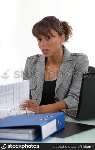 Serious businesswoman at her desk