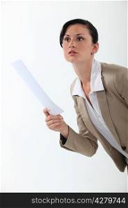 Serious businesswoman with a document