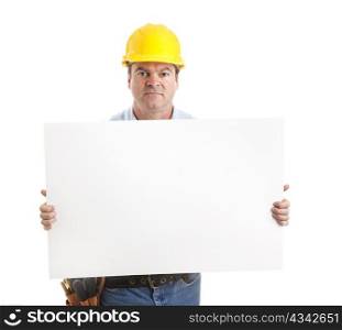 Serious construction worker carrying a blank white sign, ready for your text. Isolated on white.