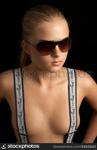 serious girl in aviator glasses