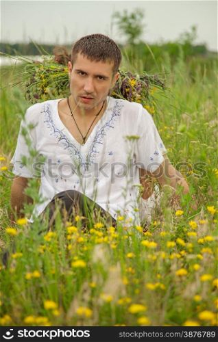 serious guy in a meadow