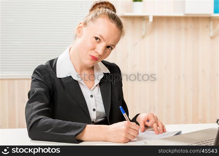 serious leader woman posing signature on important documents