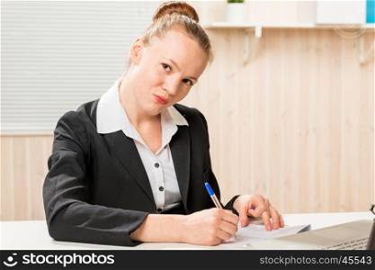 serious leader woman posing signature on important documents