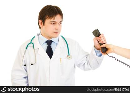 Serious medical doctor taking phone from secretary isolated on white&#xA;
