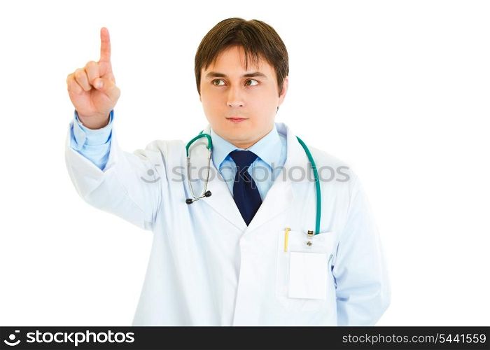 Serious medical doctor touching abstract screen isolated on white&#xA;