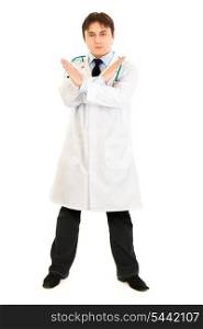Serious medical doctor with crossed arms isolated on white. Forbidden gesture.&#xA;