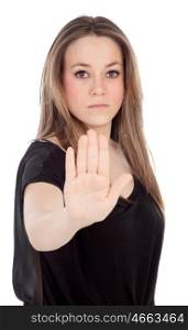 Serious woman asking to stop with his hand isolated on a white background