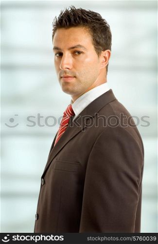 serious young business man close up portrait