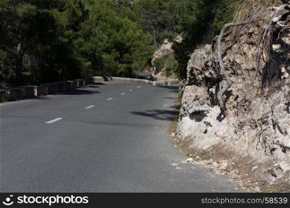 Serpentine road in the mountains. Mountain road on the west coast of Mallorca, Spain.