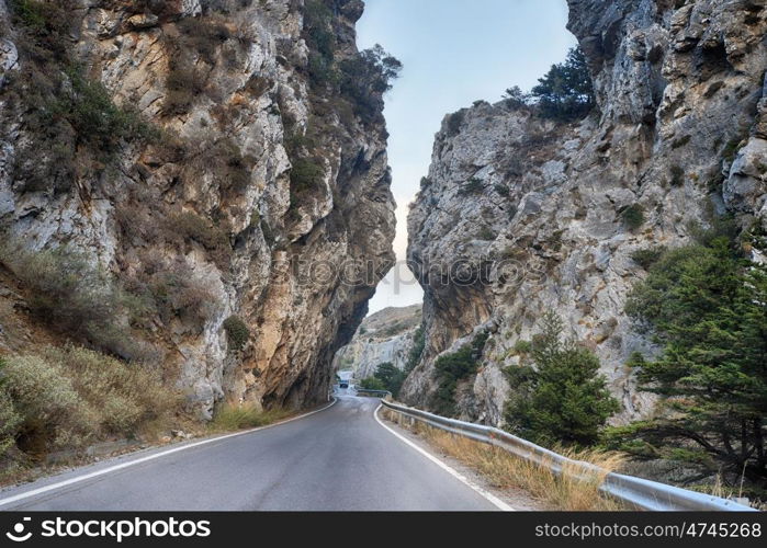 serpentine road winds through mountain