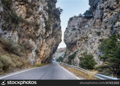 serpentine road winds through mountain