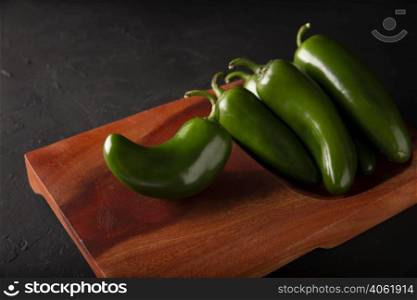 Serrano Chile or Green Chile. (Capsicum annum). Very popular variety of hot chili in Mexican cuisine, it is commonly consumed fresh in a wide variety of sauces and dishes.