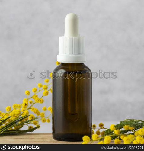 serum bottle plant arrangement