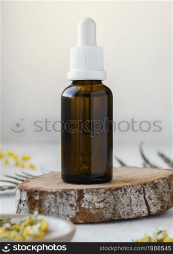 serum bottle wooden piece. High resolution photo. serum bottle wooden piece. High quality photo