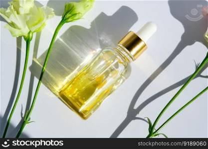 Serum with yellow petals and delicate beautiful flowers.. Serum with yellow petals and delicate flowers.