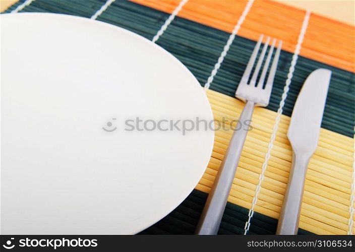 Served table with fork and knife