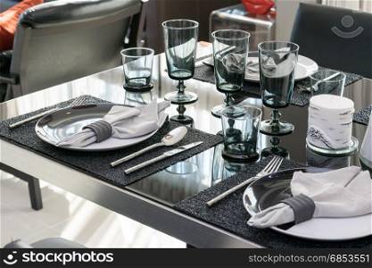 served with a plate on black table in modern dinning room
