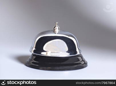 Service bell on gray background