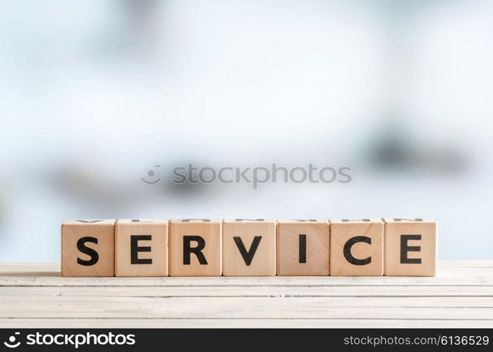 Service sign on a wood table in an office