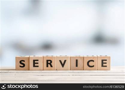 Service sign on a wood table in an office