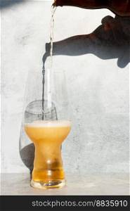 Serving beer, from a bottle to a crystal glass for IPA