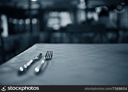 serving cutlery knife fork restaurant tablecloth