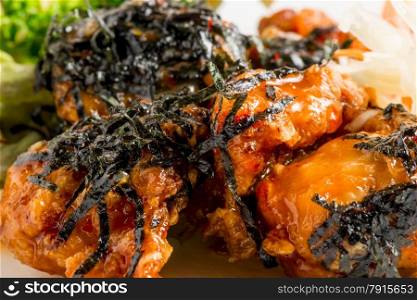 serving of chicken in sweet and sour sauce