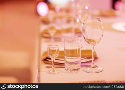 Serving on the table. Wedding. Crystal glasses. Banquet.. Serving on the table. Crystal glasses. Wedding. Banquet.