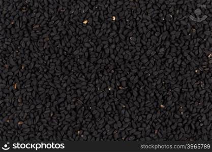 Sesame black seeds close up for background