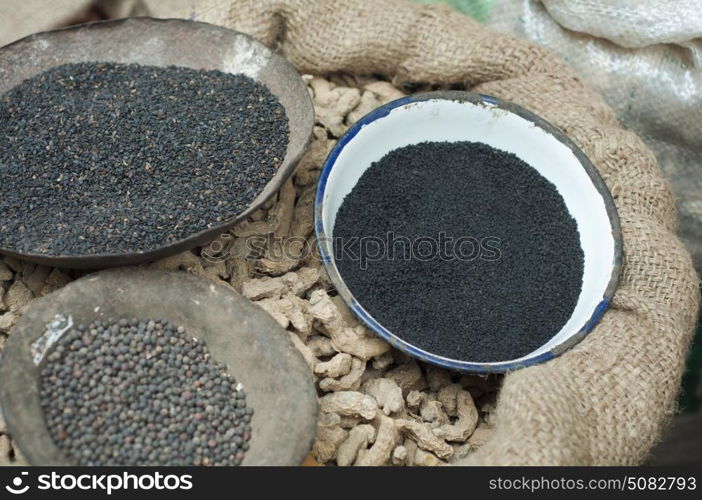 Sesame seeds black pepper and dried ginger for sale at the market