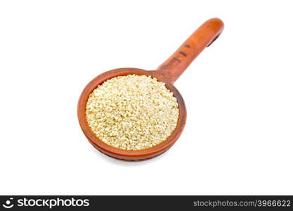 Sesame seeds in a clay dipper isolated on a white background