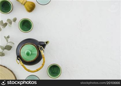 set asian herbal tea with tea brush isolated white background