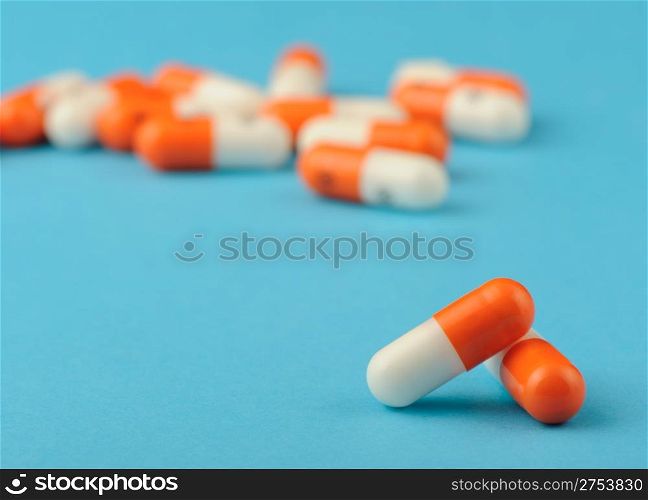 set capsules on blue background. Photo closeup