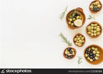 set deep plates with olives