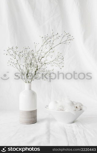 set easter eggs quills bowl near plant twigs vase
