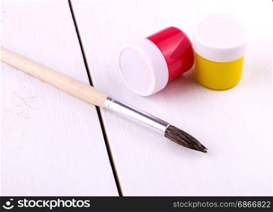 Set for drawing on white wooden table